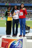 Фото с Чемпионата Мира 2011 (Тэгу, Корея). Победительница в беге на 400м с/б Лашинда Демус (США), серебро у Мелани Волкер (Ямайка), бронза у Натальи Антюх