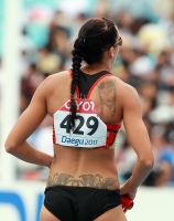 *Фото с Чемпионата Мира 2011 (Тэгу, Корея). Эстафета 4х400м (забеги). Янин Линденберг (Германия)